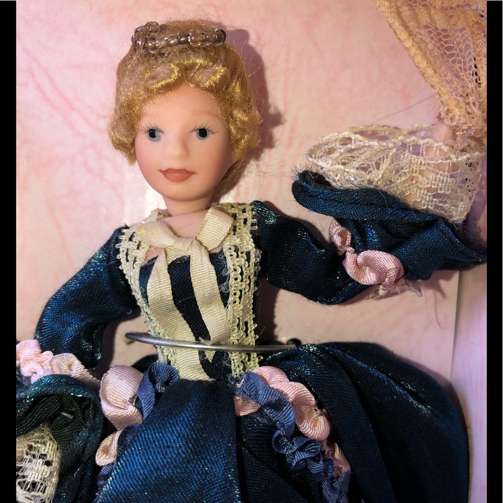 Miniature Victorian Porcelain doll new in box.